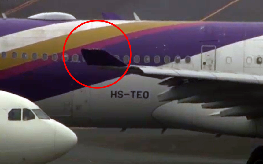 日本東京羽田機(jī)場兩架飛機(jī)擦撞 泰國航空飛機(jī)撞上長榮航空飛機(jī) 日本東京羽田機(jī)場兩架飛機(jī)擦撞 泰國航空飛機(jī)撞上長榮航空飛機(jī)